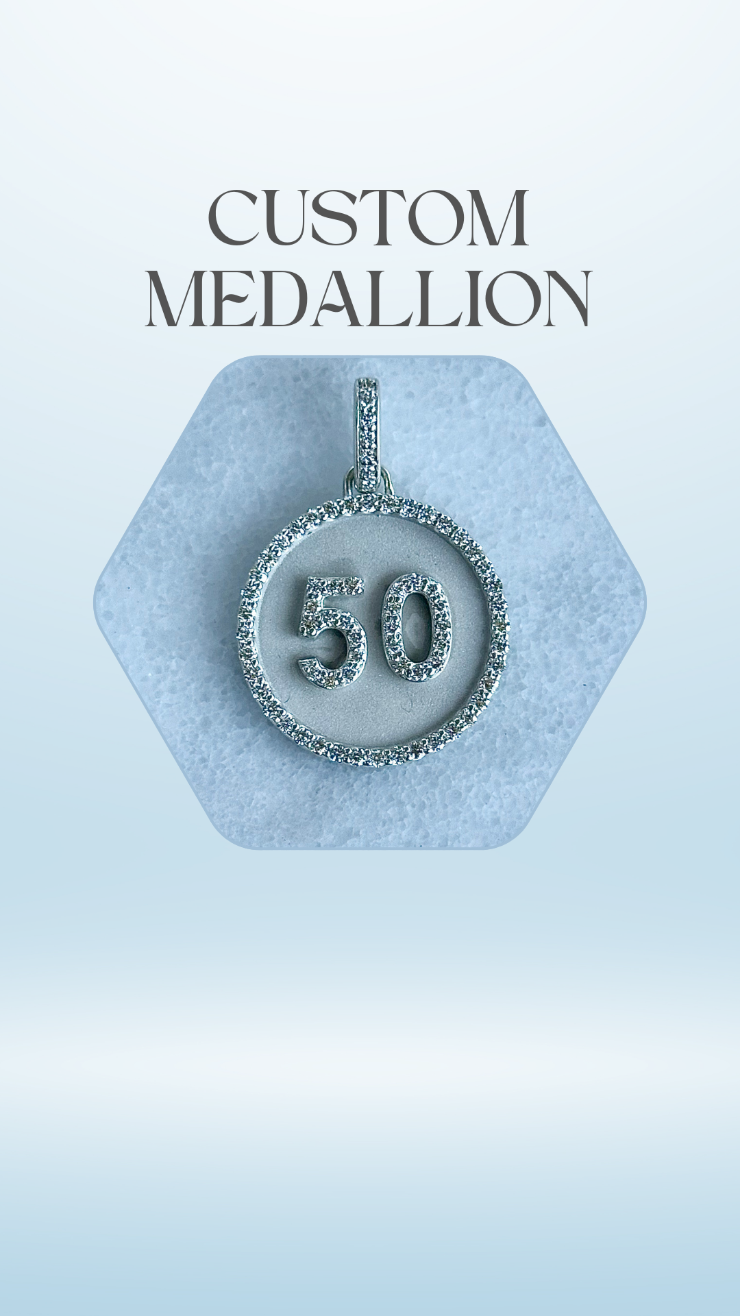 This is a picture of a silver medallion on a blue background.  The top caption says "Custom Medallion."
