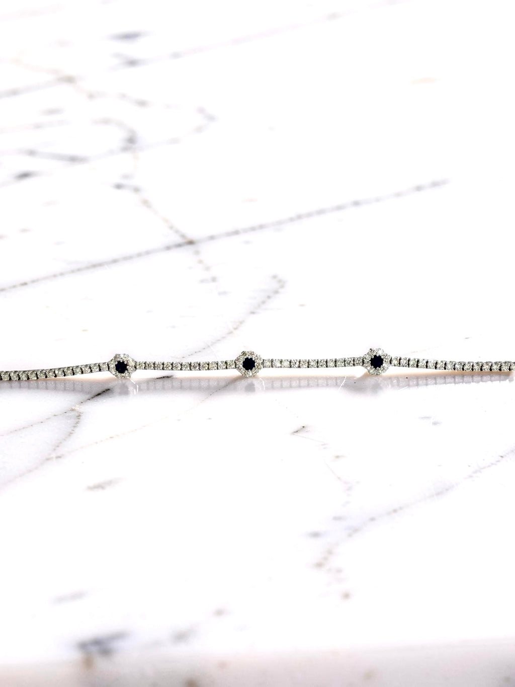 14KW Gold Sapphire and Diamond Flower Tennis Bracelet