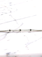 14KW Gold Sapphire and Diamond Flower Tennis Bracelet