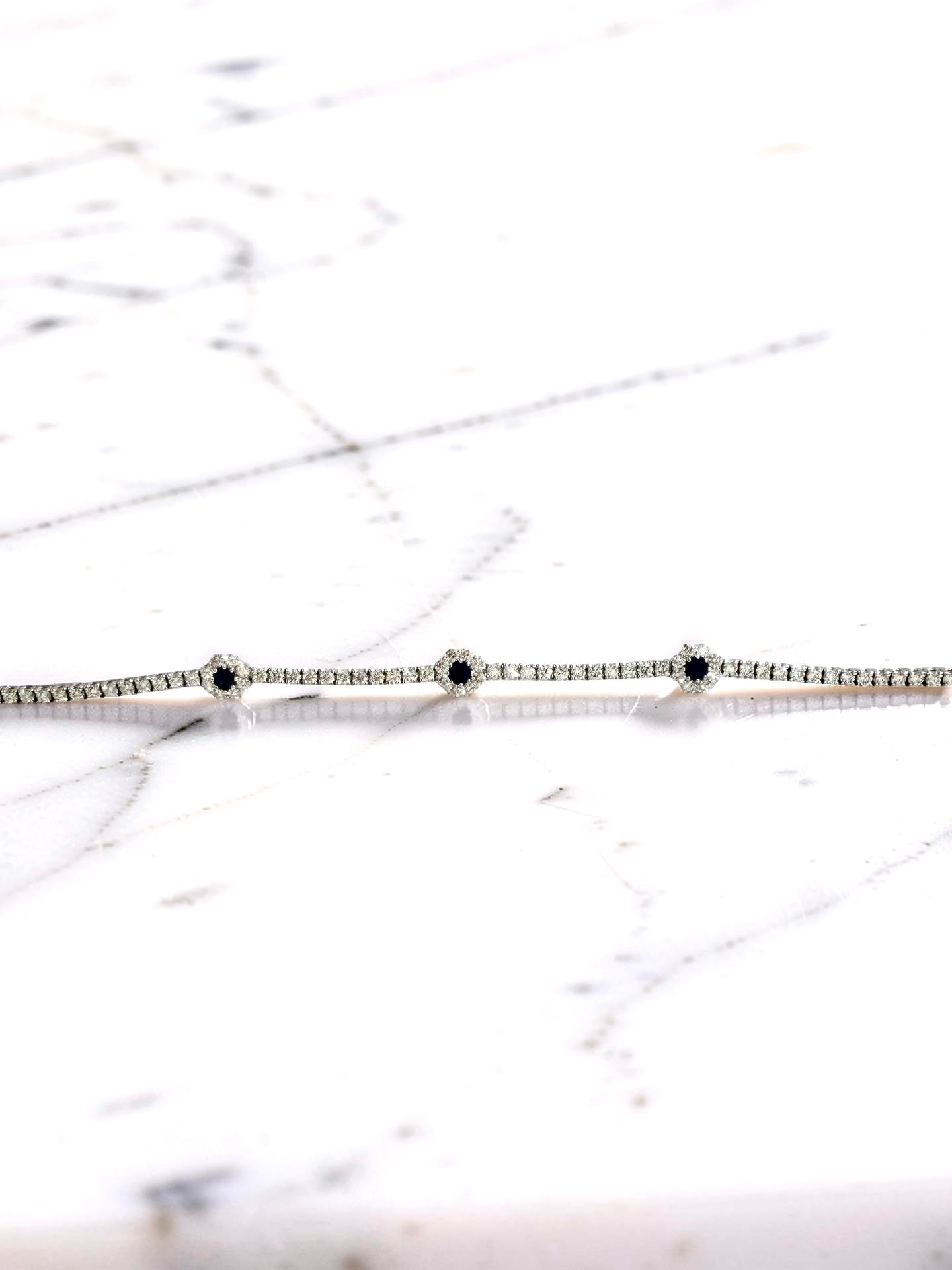14KW Gold Sapphire and Diamond Flower Tennis Bracelet