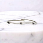 14KW Gold Sapphire and Diamond Flower Tennis Bracelet