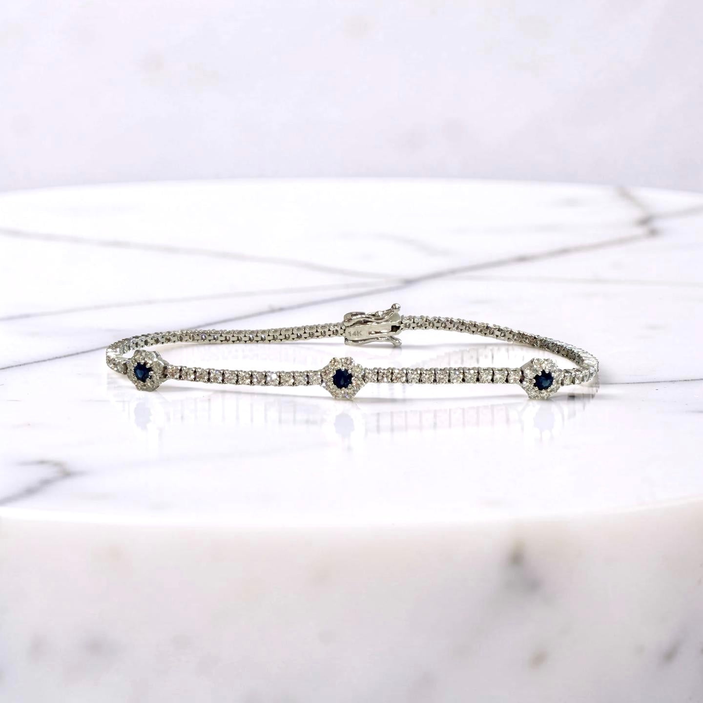 14KW Gold Sapphire and Diamond Flower Tennis Bracelet